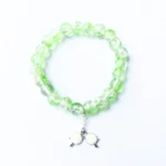 Lilac and clear crackle bead bracelet with flower charm